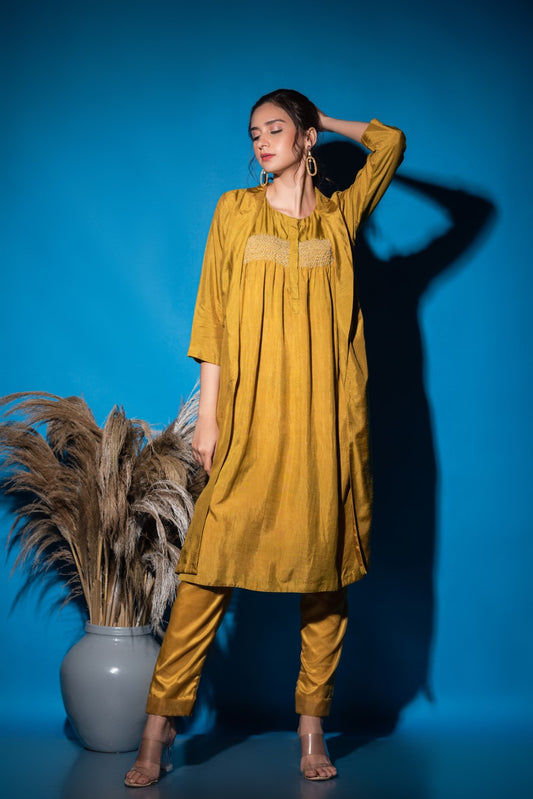 Yellowish green smocking kurti set