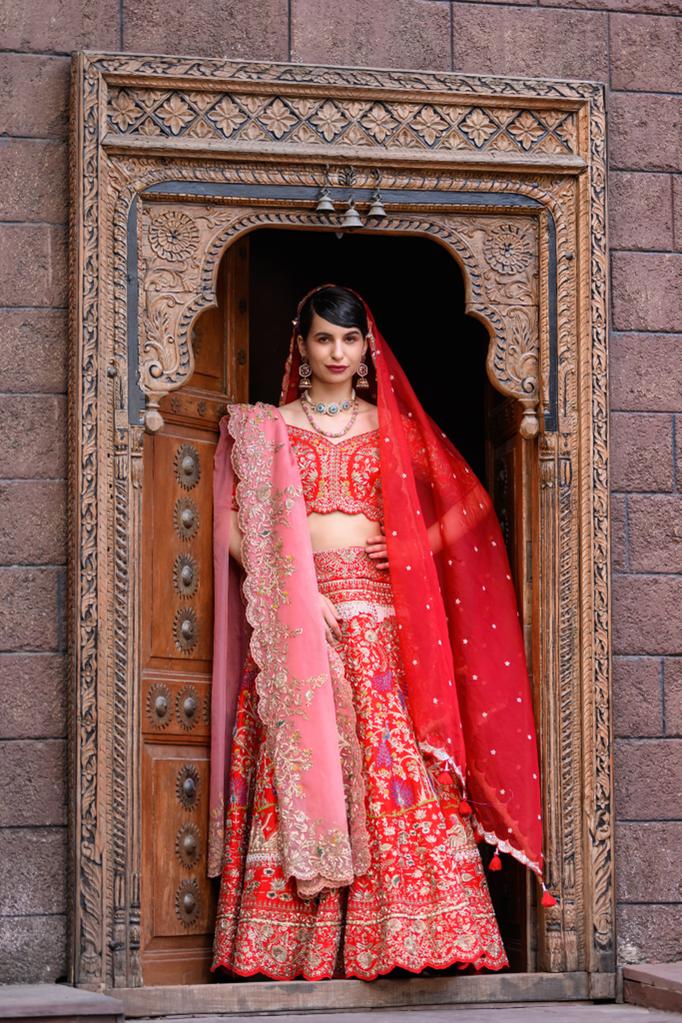 Red bridal boat embroidered lehenga set