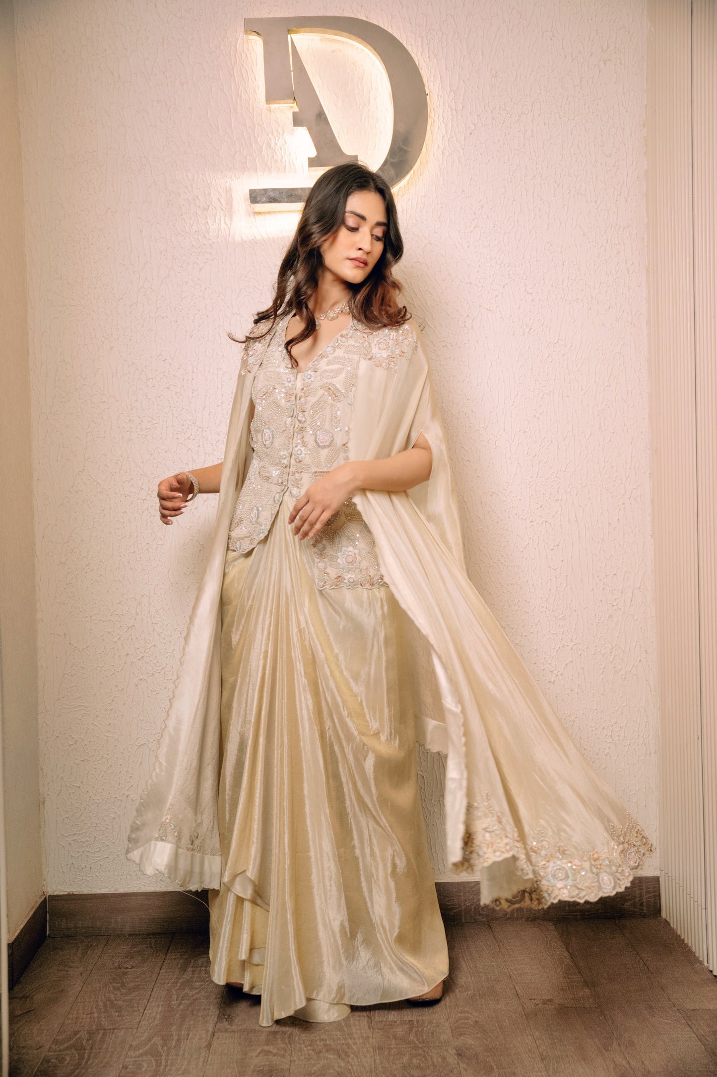 Ivory Waistcoat Paired With Pick Up Skirt And Embroidered Cape