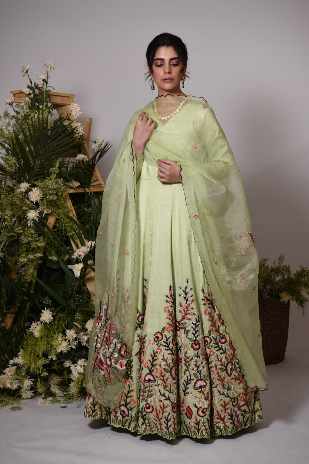 Pista green anarkali gown set