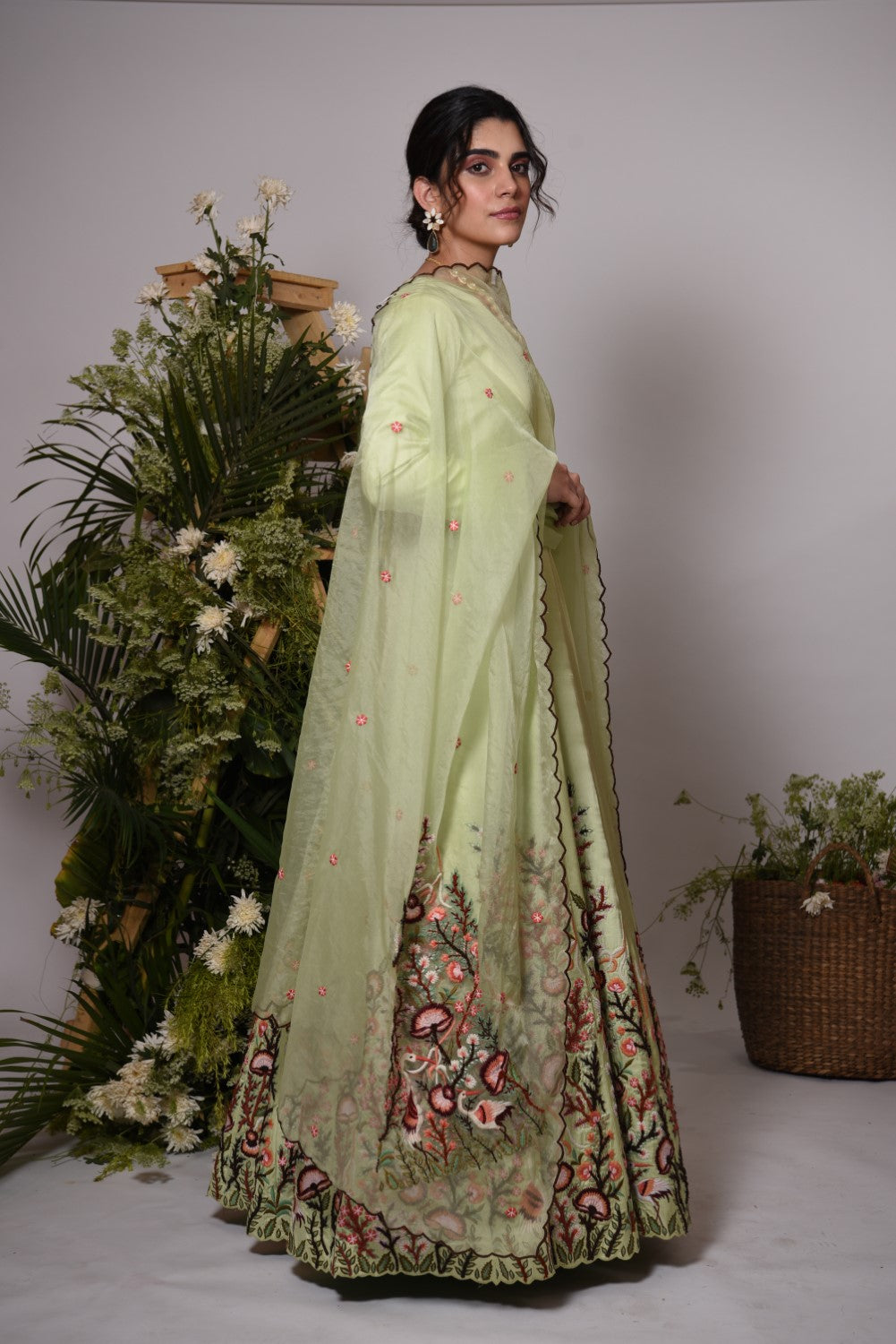 Pista green anarkali gown set