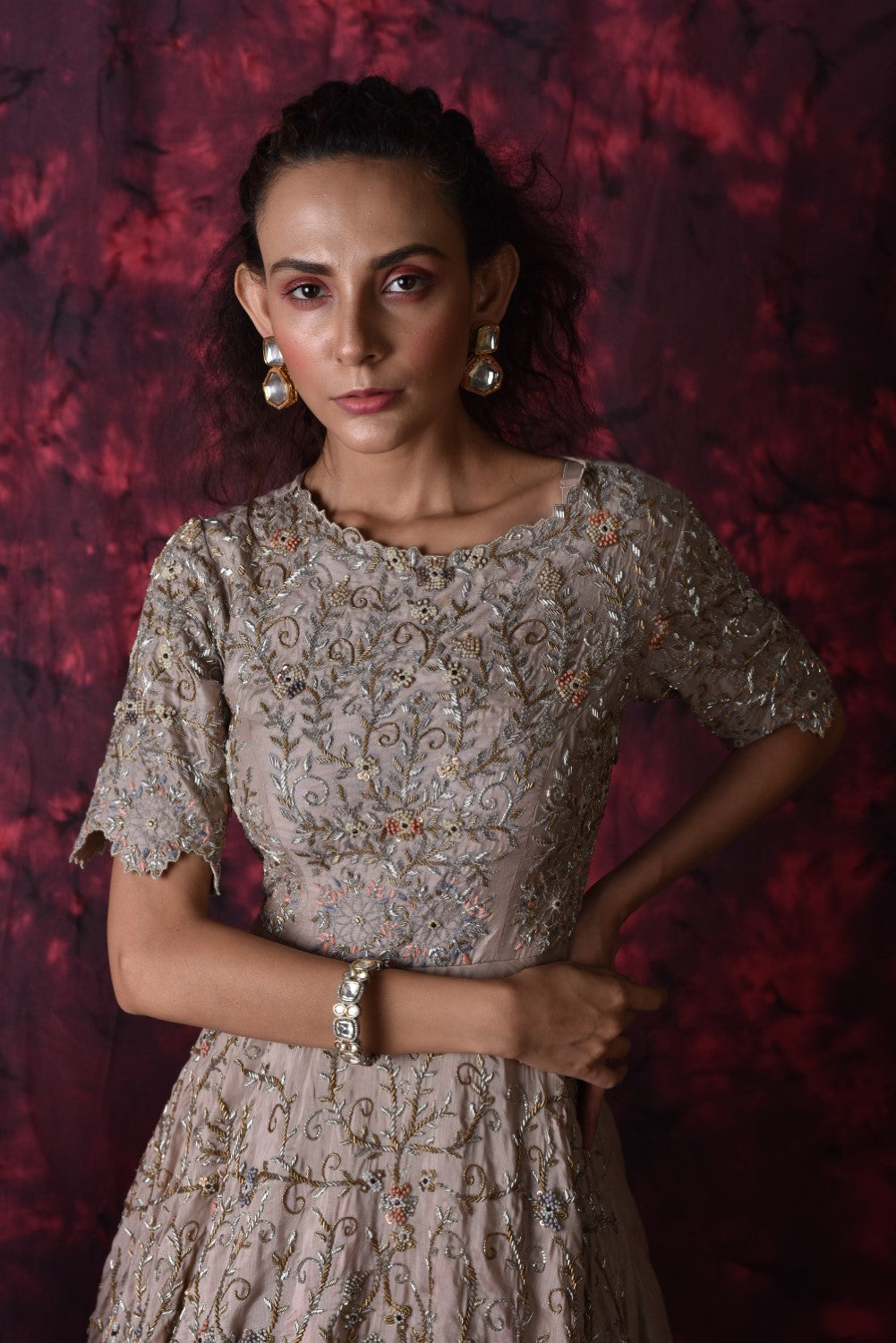 Beige embellished layered gown