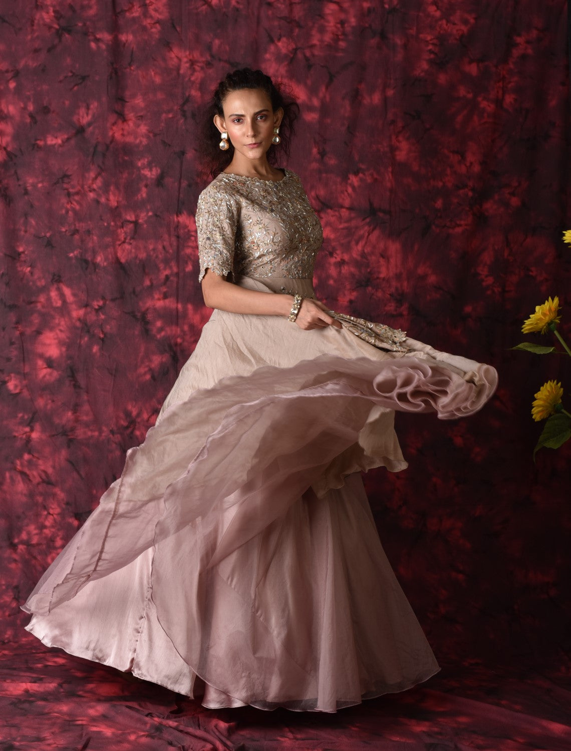 Beige embellished layered gown