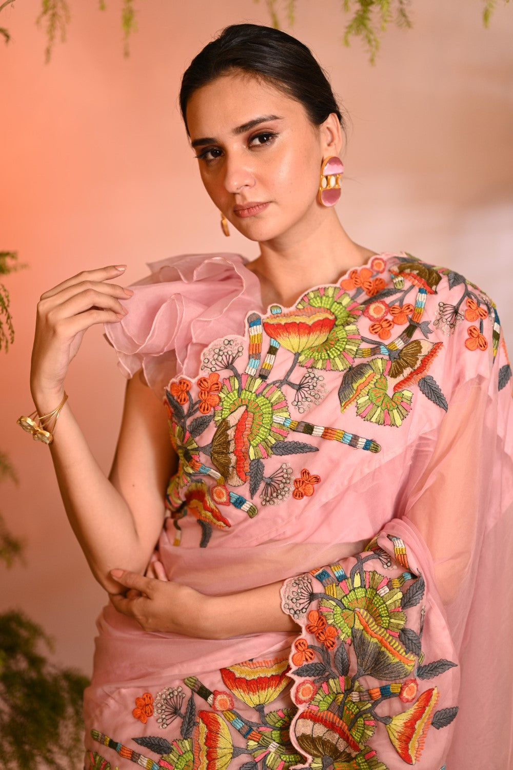 Pink organza embroidered sari with ruffle blouse